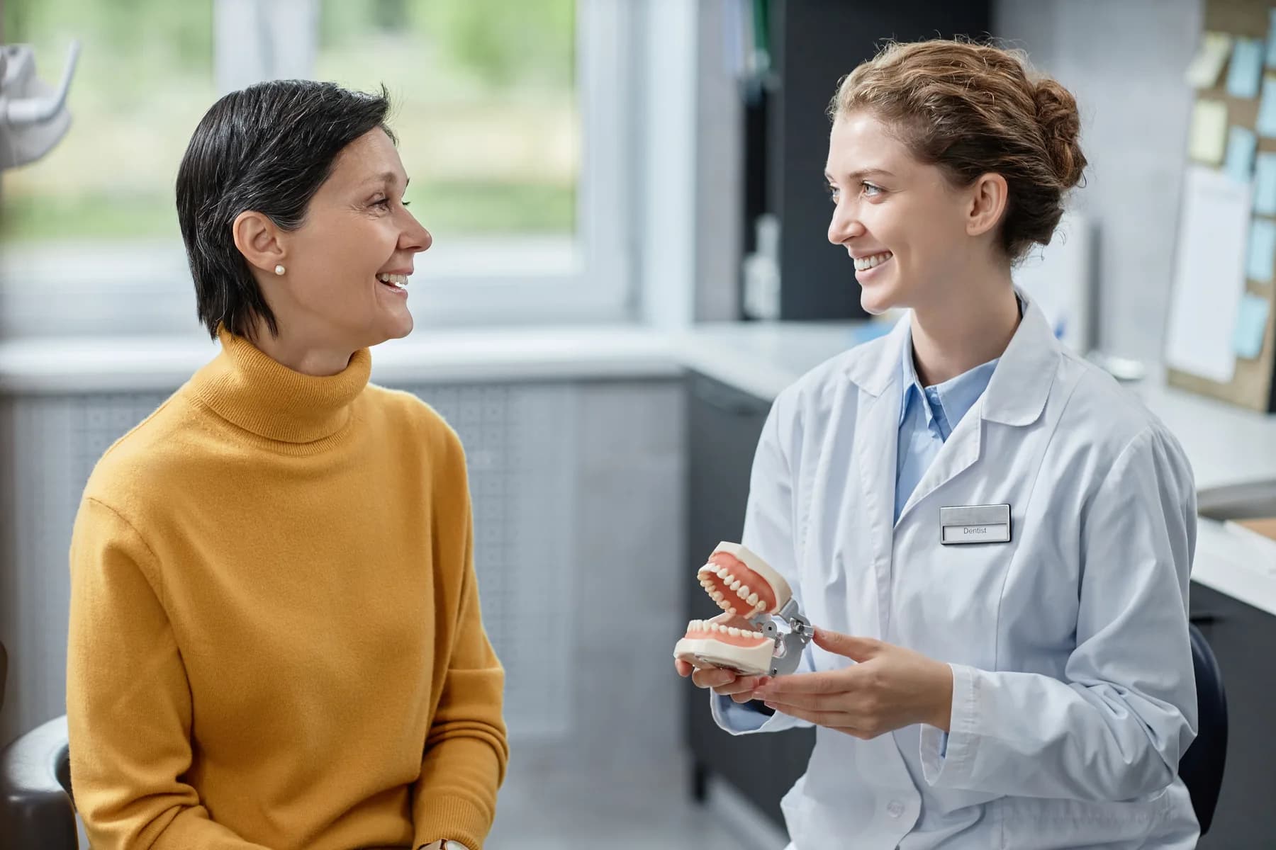 A clinician discussing a dental appliance with a patient